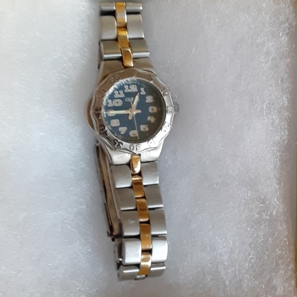 Two tone silver and gold tone ladies Guess watch